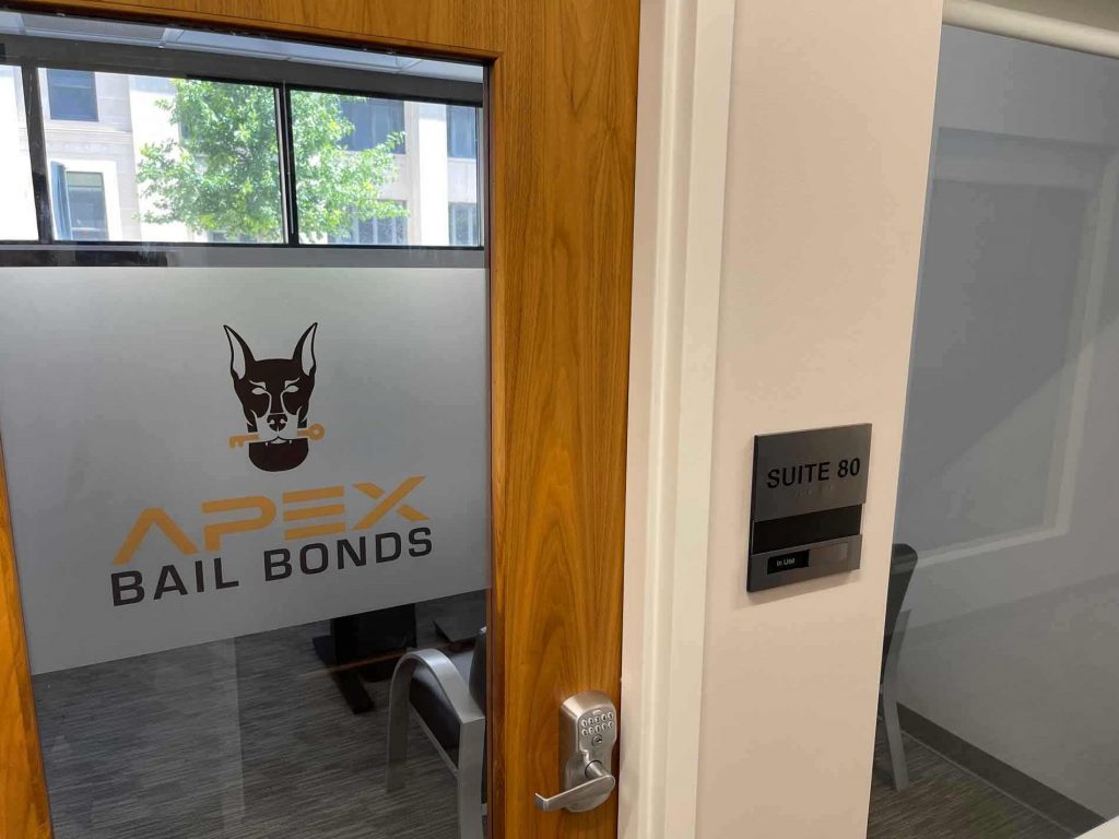 A professional image representing the surety bail bond process at Apex Bail Bonds in Danville, VA. The image features a legal contract on a desk, a judge’s gavel, and a set of car keys, symbolizing collateral used in bail agreements. Apex Bail Bonds, available 24/7 at (434) 548-2739, provides fast and affordable surety bail bonds, ensuring families can secure a loved one’s release without paying the full cash bail upfront. Serving both Virginia and North Carolina, our licensed bail bondsmen guide you through every step of the process.
